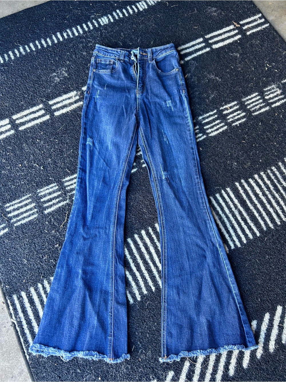 Women’s Blue Flared Jeans — Distressed Hem